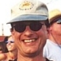 Mark in a baseball cap
